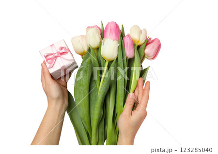PNG, March 8. Gift box with flowers in hands, isolated on white background. PNG, March 8. Gift box with flowers in hands, isolated on white background. 123285040