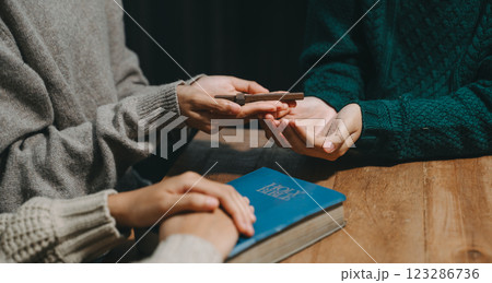 Christians are congregants join hands to pray and seek the blessings of God. 123286736