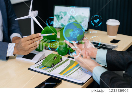 Business team people planning hand using laptop for working technology and business Net zero and carbon neutral concept.NET ZERO Business team people planning hand using laptop for working technology and business Net zero and carbon neutral concept.NET ZERO 123286905