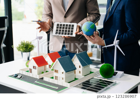 Business team people planning hand using laptop for working technology and business Net zero and carbon neutral concept.NET ZERO 123286907