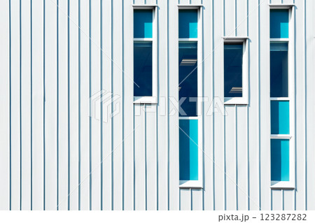 Office building with geometric design in the downtown area of the city. 123287282