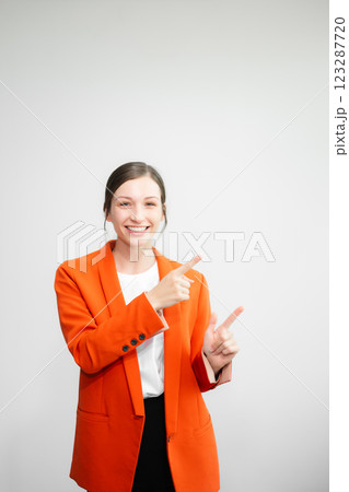 Young fun successful employee business woman corporate wear work in office area mock up isolated on plain white background Young fun successful employee business woman corporate wear work in office area mock up isolated on plain white background 123287720