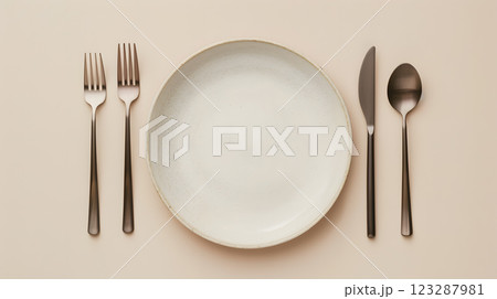 Cutlery, fork, knife, spoon and empty plate on a colored background. AI Generated 123287981