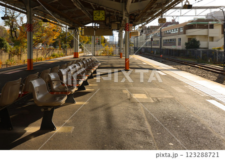 Empty Urban Train Station Platform with Tracks in Bright Nishi Tachikawa Dec 4 2024 123288721