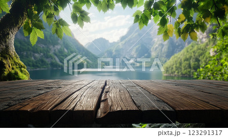 Wooden deck overlooking a serene lake surrounded by lush green mountains. The scene captures a tranquil and natural outdoor setting. Wooden deck overlooking a serene lake surrounded by lush green mountains. The scene captures a tranquil and natural outdoor setting. 123291317