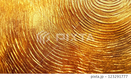 Opulent golden texture with curved line patterns, creating a luxurious and inviting surface for creative art and design applications. 123291777