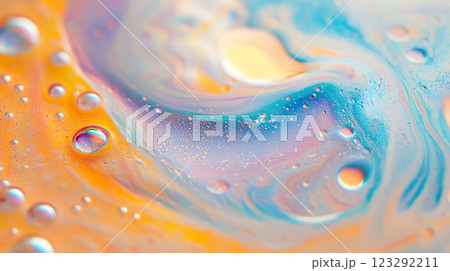 Colorful abstract macro featuring water droplets and swirling patterns in blue, orange, and white, creating a vibrant, dreamy aesthetic. Colorful abstract macro featuring water droplets and swirling patterns in blue, orange, and white, creating a vibrant, dreamy aesthetic. 123292211