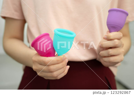 Asian woman holding menstrual cup for hygiene menstrual period cycle protection. Asian woman holding menstrual cup for hygiene menstrual period cycle protection. 123292867