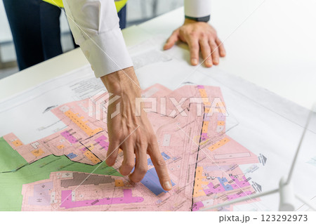 Close up picture of a table with a project plan on it 123292973