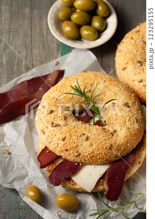 Burger with basturma and olives 123295155