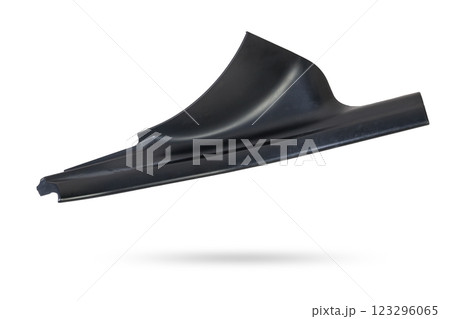 A black plastic decorative door sills in an automobile parsing for sale or repair in a workshop on a white isolated background in a photo studio. A black plastic decorative door sills in an automobile parsing for sale or repair in a workshop on a white isolated background in a photo studio. 123296065