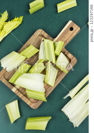 Celery sticks on a wooden board. 123297166