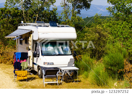 Clothes hanging to dry outdoors by camping car. Caravan vacation. Clothes hanging to dry outdoors by camping car. Caravan vacation. 123297252