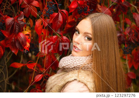Portrait girl relaxing walking in autumnal park. 123297276