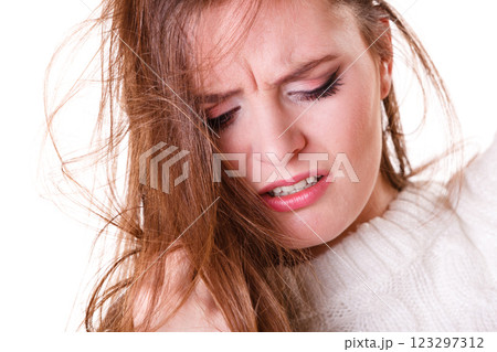 Woman pulls hair with problems. Woman pulls hair with problems. 123297312