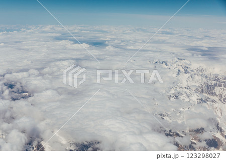 Mountain view with clouds from flying plane 123298027