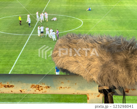 Microphone for sound recording in a football stadium Microphone for sound recording in a football stadium 123298041
