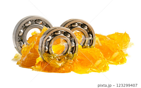 Ball bearing stainless with grease lithium machinery lubrication for automotive and industrial isolated on white background. Ball bearing stainless with grease lithium machinery lubrication for automotive and industrial isolated on white background. 123299407