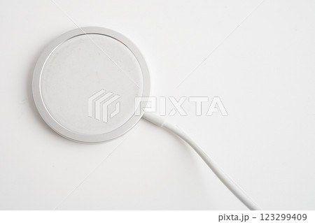 Wireless charger, magnetic charging modern equipment of mobile phone. 123299409