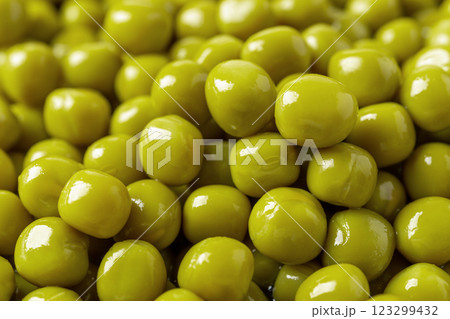 Heap of canned organic green peas closeup. 123299432