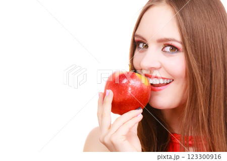 Woman charming girl colorful makeup holds apple fruit 123300916