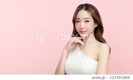 Beautiful young asian woman with clean fresh skin on pink background, Face care, Facial treatment, Cosmetology, beauty and spa, Asian women portrait. Beautiful young asian woman with clean fresh skin on pink background, Face care, Facial treatment, Cosmetology, beauty and spa, Asian women portrait. 123301069