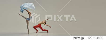 Banner. Dancers freeze in air shows classic ballet poses and controlled motion creating seamless visual flow against white background. 123304499