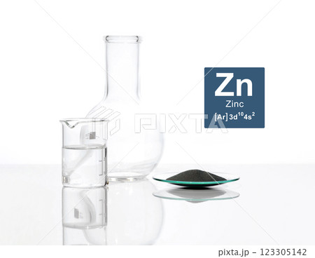 Close up chemical ingredient on white laboratory table. Zinc Powder in Chemical Watch Glass with Symbol, Name and Electron Configuration. 123305142