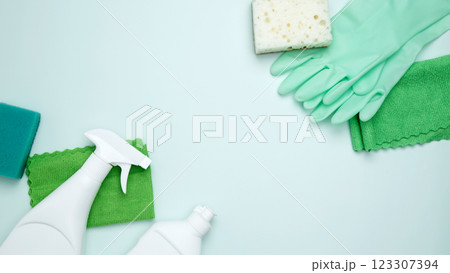 Concept of cleanliness and hygiene. Cleaning supplies and tools, including bottles, gloves, sponges, cloths 123307394