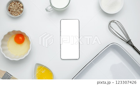 Mockup design for recipe or food blog. Cooking ingredients and smartphone with blank screen Mockup design for recipe or food blog. Cooking ingredients and smartphone with blank screen 123307426