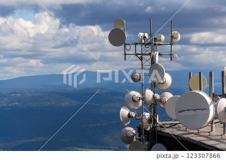 Bunch of transmitters and aerials on telecommunication tower 123307866