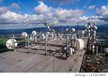 Bunch of transmitters and aerials on telecommunication tower 123307869