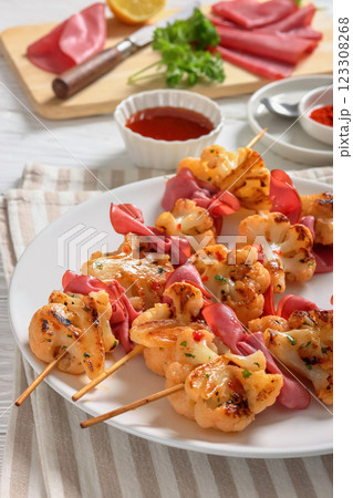 spicy cauliflower kebabs with corned beef on plate spicy cauliflower kebabs with corned beef on plate 123308268