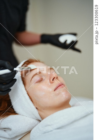 Relaxing facial treatment in a tranquil spa setting Relaxing facial treatment in a tranquil spa setting 123308619