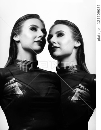 Fashion studio women portrait with fancy make-up 123309082