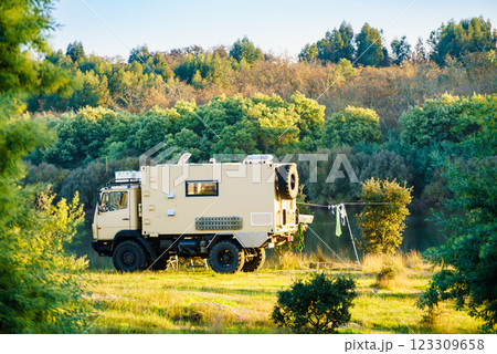Offroad camper 4x4 truck on nature Offroad camper 4x4 truck on nature 123309658