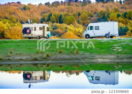 Campers rv camping at lake shore. Alentejo Portugal. 123309660