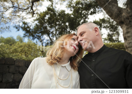 Loving couple enjoying romantic moment outdoors in madeira island, portugal 123309931