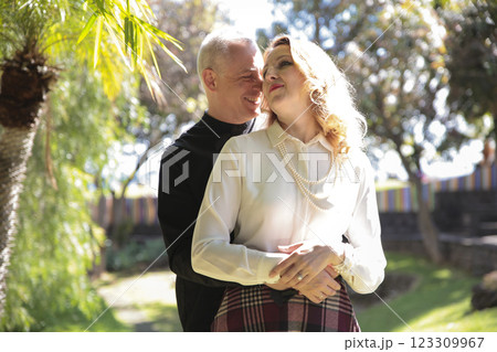 Happy couple embracing in lush tropical garden in madeira island, portugal 123309967