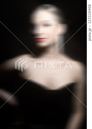 Beautiful woman classic studio portrait in motion blur effect style Beautiful woman classic studio portrait in motion blur effect style 123310408
