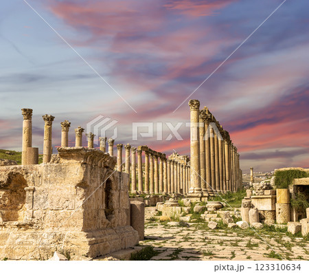 Roman ruins (against the background of a beautiful sky with clouds) in the Jordanian city of Jerash (Gerasa of Antiquity), capital and largest city of Jerash Governorate, Jordan Roman ruins (against the background of a beautiful sky with clouds) in the Jordanian city of Jerash (Gerasa of Antiquity), capital and largest city of Jerash Governorate, Jordan 123310634