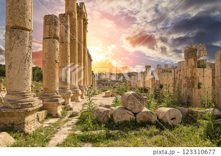 Roman ruins (against the background of a beautiful sky with clouds) in the Jordanian city of Jerash (Gerasa of Antiquity), capital and largest city of Jerash Governorate, Jordan Roman ruins (against the background of a beautiful sky with clouds) in the Jordanian city of Jerash (Gerasa of Antiquity), capital and largest city of Jerash Governorate, Jordan 123310677