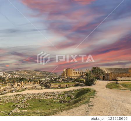 Roman ruins (against the background of a beautiful sky with clouds) in the Jordanian city of Jerash (Gerasa of Antiquity), capital and largest city of Jerash Governorate, Jordan Roman ruins (against the background of a beautiful sky with clouds) in the Jordanian city of Jerash (Gerasa of Antiquity), capital and largest city of Jerash Governorate, Jordan 123310695