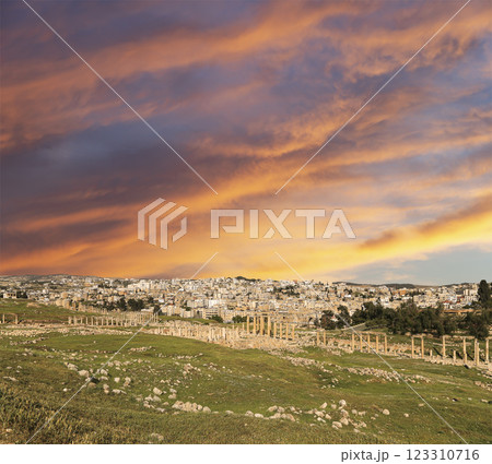 Roman ruins (against the background of a beautiful sky with clouds) in the Jordanian city of Jerash (Gerasa of Antiquity), capital and largest city of Jerash Governorate, Jordan Roman ruins (against the background of a beautiful sky with clouds) in the Jordanian city of Jerash (Gerasa of Antiquity), capital and largest city of Jerash Governorate, Jordan 123310716