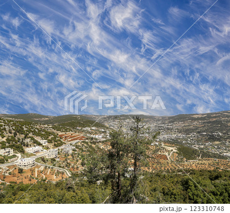 Typical mountain landscape, Jordan, Middle East  (photography from a high point). Against the background of a beautiful sky with clouds 123310748