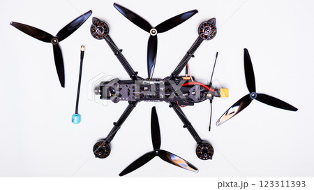 FPV drone in production on white background. 123311393