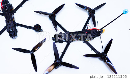 FPV drone in production on white background. 123311396