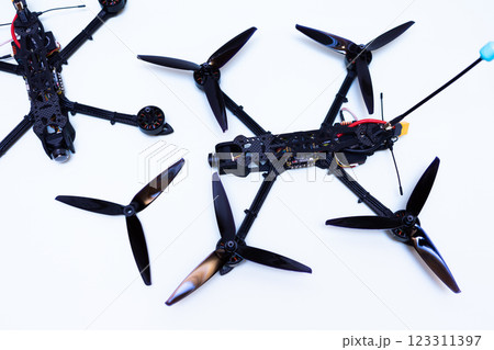 FPV drone in production on white background. 123311397