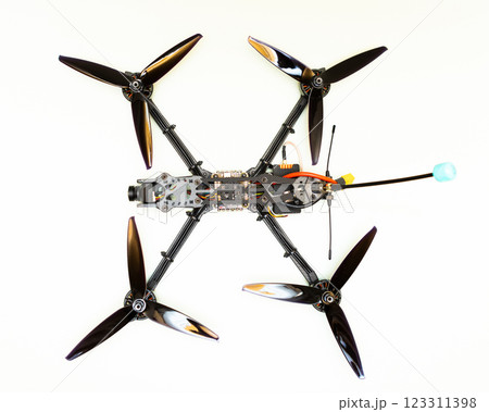 FPV drone in production on white background. 123311398