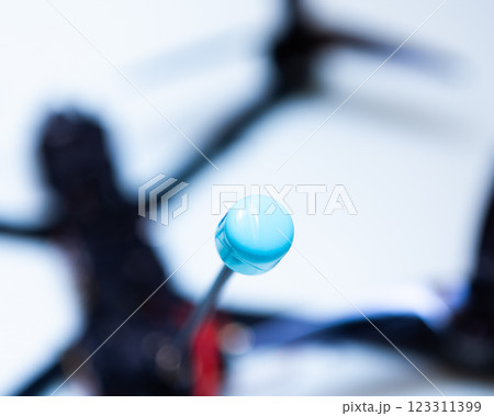 FPV drone in production on white background. 123311399